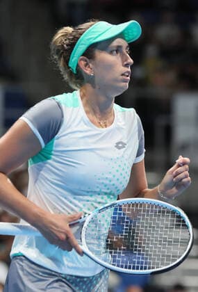 September 19, 2022, Tokyo, Japan - Elise Mertens of Belgium clinches her fist as she won the first set against China s Wang Qiang at the singles first round match at the Toray Pan Pacific Open tennis tournament at the Ariake Coliseum in Tokyo on Monday, September 19, 2022. Mertens defeated Wang 6-0, 6-3. Noxthirdxpartyxsales  (0169630852st)