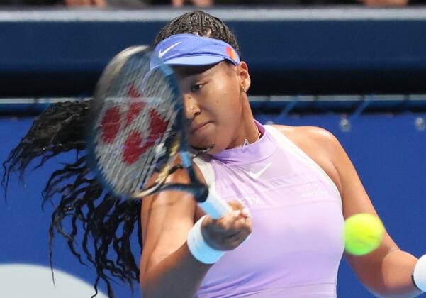 September 20, 2022, Tokyo, Japan - Naomi Osaka of Japan returns the ball against Australia s Daria Saville at the singles first round match at the Toray Pan Pacific Open tennis tournament at the Ariake Coliseum in Tokyo on Tuesday, September 20, 2022. Saville withdrew the game as her left knee injury and Osaka advanced to the second round. Noxthirdxpartyxsales  (199076120)