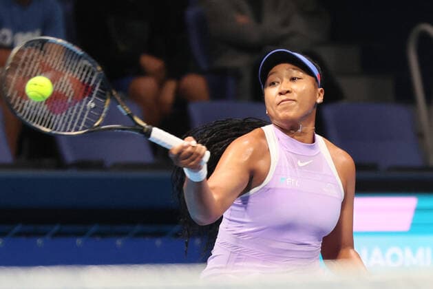 September 20, 2022, Tokyo, Japan - Naomi Osaka of Japan returns the ball against Australia s Daria Saville at the singles first round match at the Toray Pan Pacific Open tennis tournament at the Ariake Coliseum in Tokyo on Tuesday, September 20, 2022. Saville withdrew the game as her left knee injury and Osaka advanced to the second round. Noxthirdxpartyxsales  (199076123)