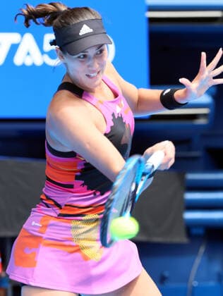 September 21, 2022, Tokyo, Japan - Former world s top ranker Gabrine Muguruza of Spain returns the ball against Despina Papamichail of Greece at the singles second round match at the Toray Pan Pacific Open tennis tournament at the Ariake Coliseum in Tokyo on Wednesday, September 21, 2022. Third seeded Muguruza defeated Papamichail 6-4, 6-2. Noxthirdxpartyxsales  (199128244)
