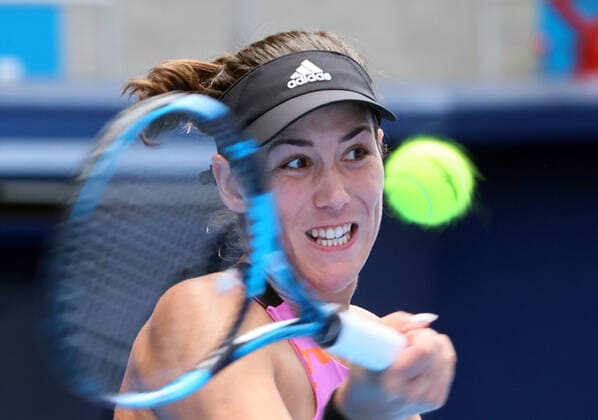 September 21, 2022, Tokyo, Japan - Former world s top ranker Gabrine Muguruza of Spain returns the ball against Despina Papamichail of Greece at the singles second round match at the Toray Pan Pacific Open tennis tournament at the Ariake Coliseum in Tokyo on Wednesday, September 21, 2022. Third seeded Muguruza defeated Papamichail 6-4, 6-2. Noxthirdxpartyxsales  (199128247)