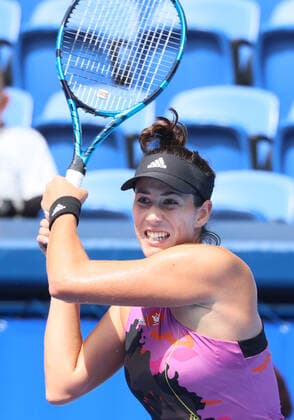 September 21, 2022, Tokyo, Japan - Former world s top ranker Gabrine Muguruza of Spain returns the ball against Despina Papamichail of Greece at the singles second round match at the Toray Pan Pacific Open tennis tournament at the Ariake Coliseum in Tokyo on Wednesday, September 21, 2022. Third seeded Muguruza defeated Papamichail 6-4, 6-2. Noxthirdxpartyxsales  (199128248)