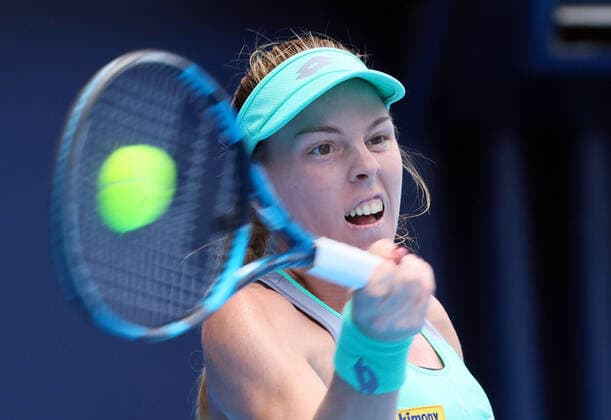 September 21, 2022, Tokyo, Japan - Despina Papamichail of Greece returns the ball against Gabrine Muguruza of Spain at the singles second round match at the Toray Pan Pacific Open tennis tournament at the Ariake Coliseum in Tokyo on Wednesday, September 21, 2022. Third seeded Muguruza defeated Papamichail 6-4, 6-2. Noxthirdxpartyxsales  (199128251)
