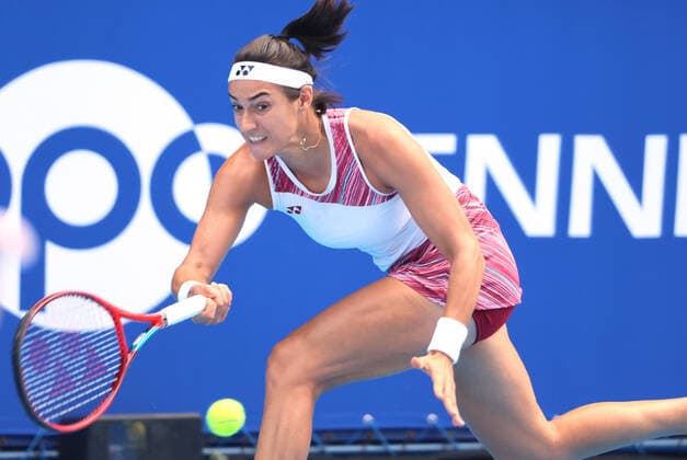 September 21, 2022, Tokyo, Japan - Caroline Garcia of France returns the ball against China s Zhang Shuai at the singles second round match at the Toray Pan Pacific Open tennis tournament at the Ariake Coliseum in Tokyo on Wednesday, September 21, 2022. Noxthirdxpartyxsales  (199136513)