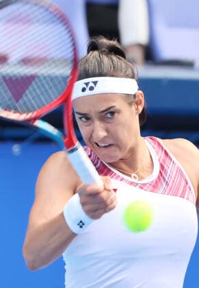 September 21, 2022, Tokyo, Japan - Caroline Garcia of France returns the ball against China s Zhang Shuai at the singles second round match at the Toray Pan Pacific Open tennis tournament at the Ariake Coliseum in Tokyo on Wednesday, September 21, 2022. Noxthirdxpartyxsales  (199136514)