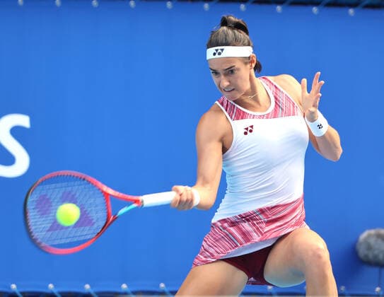 September 21, 2022, Tokyo, Japan - Caroline Garcia of France returns the ball against China s Zhang Shuai at the singles second round match at the Toray Pan Pacific Open tennis tournament at the Ariake Coliseum in Tokyo on Wednesday, September 21, 2022. Noxthirdxpartyxsales  (199136515)