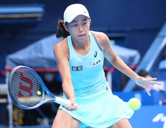 September 21, 2022, Tokyo, Japan - Zhang Shuai of China returns the ball against France s Caroline Garcia at the singles second round match at the Toray Pan Pacific Open tennis tournament at the Ariake Coliseum in Tokyo on Wednesday, September 21, 2022. Noxthirdxpartyxsales  (199136521)