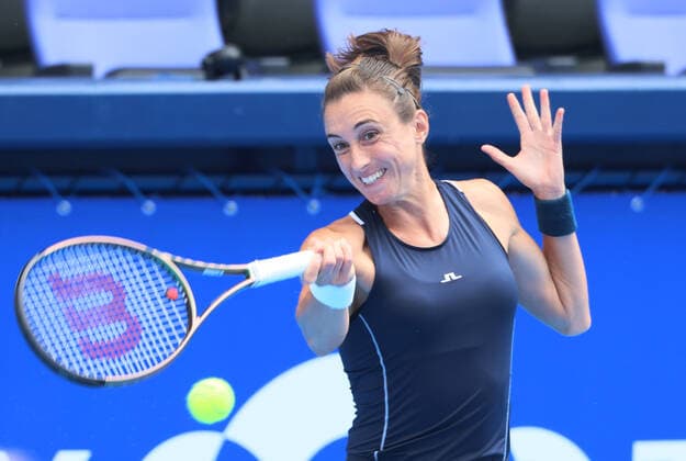 September 22, 2022, Tokyo, Japan - Petra Martic of Croatia returns the ball against Karolina Pliskova of Czech Republic at the singles second round match at the Toray Pan Pacific Open tennis tournament at the Ariake Coliseum in Tokyo on Thursday, September 22, 2022. Martic defeated 6th seeded Pliskova 6-3, 6-4. Noxthirdxpartyxsales  (0169828487st)