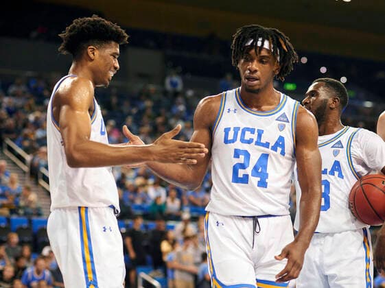 September 21, 2022, Westwood, California, USA: Former UCLA basketball player, Jalen Hill dies in Costa Rica. He was 22. FILE PHOTO: Bruins team mates Chris Smith, Jalen Hill and Prince Ali share high fives following a play during the contest as the host UCLA Bruins defeat the visiting UCSB Gauchos 77-61 on Sunday November 10, 2019 at Pauley Pavilion on the beautiful UCLA Campus in Westwood, California. PI Westwood USA - ZUMAp124 20220921_zaa_p124_019 Copyright: xBURTxHARRISx