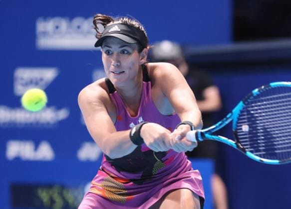 September 23, 2022, Tokyo, Japan - Garbine Muguruza of Spain returns the ball against Ludmila Samsonova of Russia at the singles quarter final match at the Toray Pan Pacific Open tennis tournament at the Ariake Coliseum in Tokyo on Friday, September 23, 2022. Samsonova defeated Muguruza 6-4, 6-2. Noxthirdxpartyxsales  (0169892325st)