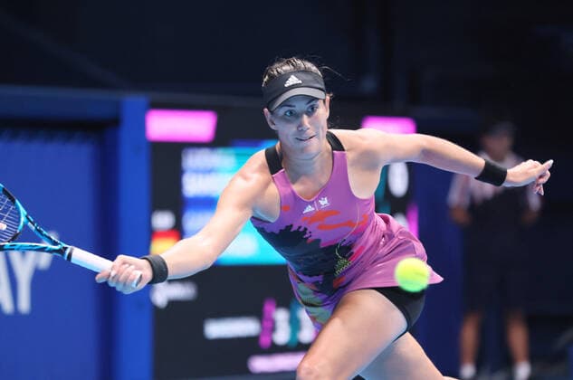 September 23, 2022, Tokyo, Japan - Garbine Muguruza of Spain returns the ball against Ludmila Samsonova of Russia at the singles quarter final match at the Toray Pan Pacific Open tennis tournament at the Ariake Coliseum in Tokyo on Friday, September 23, 2022. Samsonova defeated Muguruza 6-4, 6-2. Noxthirdxpartyxsales  (0169892326st)