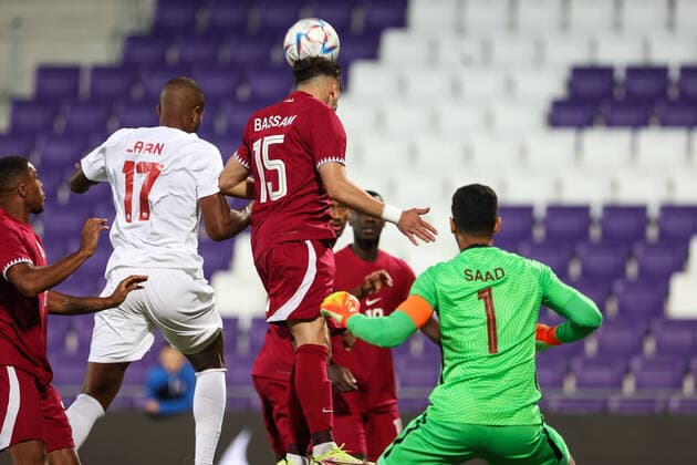 SOCCER - QAT vs CAN, test match VIENNA,AUSTRIA,23.SEP.22 - SOCCER - International test match, Qatar vs Canada. Image shows Cyle Larin (CAN), Bassam Husham Al Rawi and Saad Abdulla Alsheeb (QAT).  GEPAxpictures xArminxRauthner