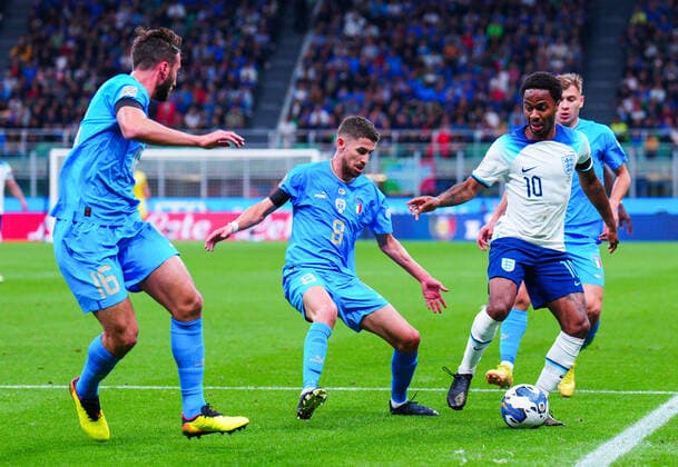 Mandatory Credit: Photo by Javier Garcia Shutterstock (13413805ao) Raheem Sterling of England surrounded by the Italian defence and Jorginho, Nicolò Barella and Bryan Cristante of Italy Italy v England, UEFA Nations League, Group A3, International Football, Stadio Giuseppe Meazza, Milan, Italy - 23 Sep 2022 EDITORIAL USE ONLY No use with unauthorised audio, video, data, fixture lists, club league logos or live services. Online in-match use limited to 120 images, no video emulation. No use in betting, games or single club league player publications. Italy v England, UEFA Nations League, Group A3, International Football, Stadio Giuseppe Meazza, Milan, Italy - 23 Sep 2022 EDITORIAL USE ONLY No use with unauthorised audio, video, data, fixture lists, club league logos or live services. Online in-match use limited to 120 images, no video emulation. No use in betting, games or single club league player publications.  Copyright: xJavierxGarcia Shutterstockx 13413805ao