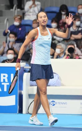 September 24, 2022, Tokyo, Japan - Zheng Qinwen of China reacts to audience after she defeated Veronika Kudermetova of Russia at the singles semi final match at the Toray Pan Pacific Open tennis tournament at the Ariake Coliseum in Tokyo on Saturday, September 24, 2022. Zheng defeated Kudermetova 5-7, 6-3, 7-6. Noxthirdxpartyxsales  (0169946641st)