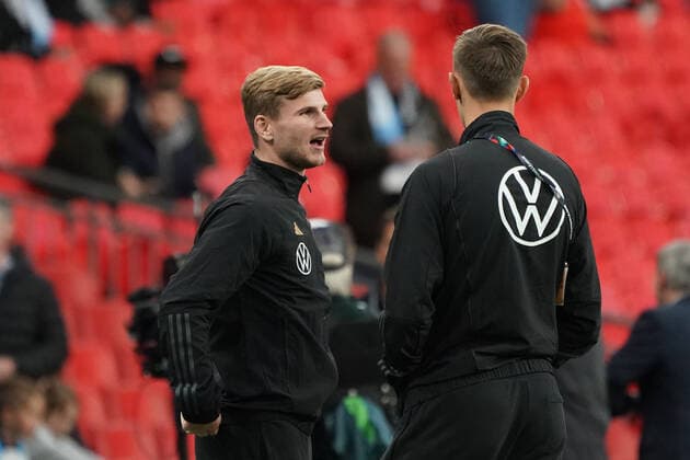 Timo Werner Germany Germany , Nico Schlotterbeck Germany with hand in front of mouth while talking London 26 09 2022 England vs Germany, UEFA Nations League, Matchday 6, Wembley Stadium