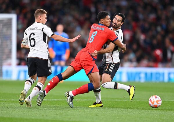 Football International UEFA Nations League 26 09 2022 at Wembley England Germany Jude Bellingham center, England vs Joshua Kimmich left and Ilkay Guendogan right, both Germany