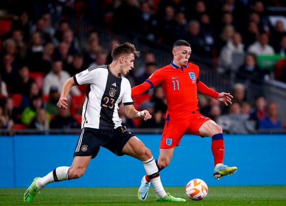England v Germany UEFA Nations League Phil Foden of England pressures Nico Schlotterbeck of Germany during the UEFA Nations League Group C match at Wembley Stadium, London Content Not Available For UK Newspapers Copyright: xPaulxChestertonx FIL-17392-0039 UK Newspapers OUT