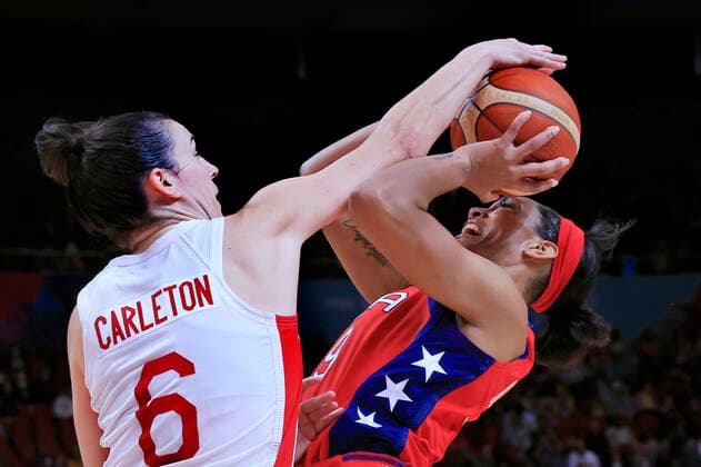 BASKETBALL CANADA USA, A?Ja Wilson of USA competes for the ball with Bridget Carleton of Canada during the 2022 FIBA Women s Basketball World Cup Semi Final 1 match between Canada and the USA at Qudos Bank Arena in Sydney, Friday, September 30, 2022. ( NO ARCHIVING, EDITORIAL USE ONLY, NO USE IN BOOKS WITHOUT CONSENT SYDNEY NEW SOUTH WALES AUSTRALIA  Copyright: xMARKxEVANSx 20220930001709555682