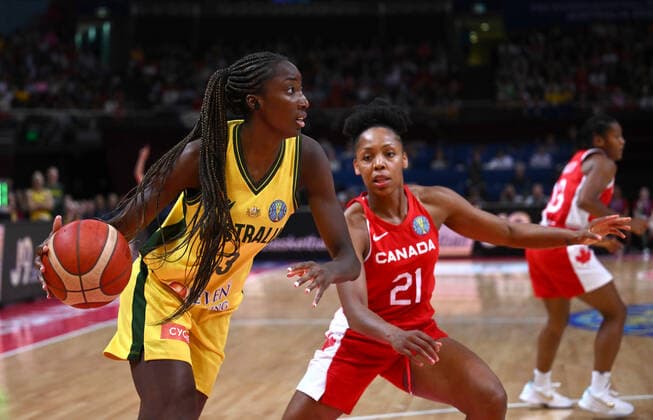 BASKETBALL WOMENS WORLD CUP 3RD, Ezi Magbegor (left) of Australia in action during the 2022 FIBA Women s Basketball World Cup 3rd Place match between Australia and Canada at Qudos Bank Arena in Sydney, Saturday, October 1, 2022. ( NO ARCHIVING, EDITORIAL USE ONLY, NO USE IN BOOKS WITHOUT CONSENT SYDNEY NEW SOUTH WALES AUSTRALIA  Copyright: xJAMESxGOURLEYx 20221001001709930407