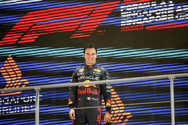 PEREZ Sergio (mex), Red Bull Racing RB18, portrait, podium during the Formula 1 Singapore Airlines Singapore Grand Prix 2022, 17th round of the 2022 FIA Formula One World Championship, WM, Weltmeisterschaft from September 30 to October 02, 2022 on the Marina Bay Street Circuit, in Singapore - F1 - SINGAPORE GRAND PRIX 2022 - RACE DPPI Panoramic  GOOD4800