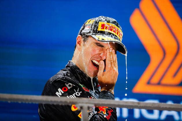 PEREZ Sergio (mex), Red Bull Racing RB18, portrait podium during the Formula 1 Singapore Airlines Singapore Grand Prix 2022, 17th round of the 2022 FIA Formula One World Championship, WM, Weltmeisterschaft from September 30 to October 02, 2022 on the Marina Bay Street Circuit, in Singapore - F1 - SINGAPORE GRAND PRIX 2022 - RACE DPPI Panoramic  00122040__V2_4706
