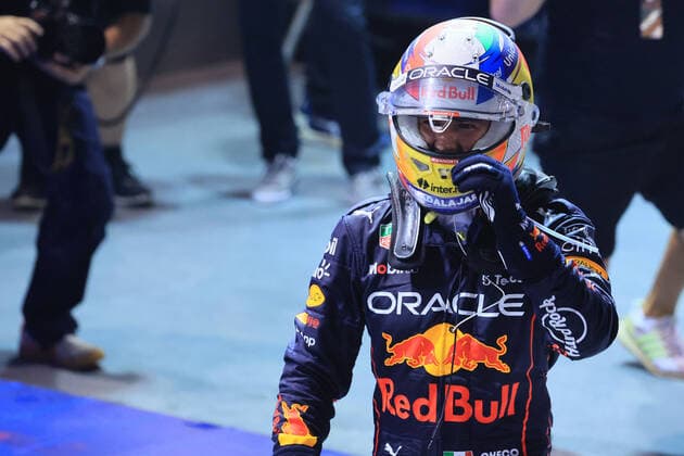October 2nd 2022; Marina Bay, Singapore, Singapore FIA Formula 1 Grand Prix: Race day: Oracle Red Bull Racing, Sergio Perez takes the win as he celebrates in parc ferme  ActionPlus12432181 Octane