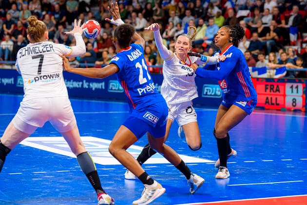 Handball, women international match France Germany from left Meike Schmelzer Germany , Orlane Kanor France , Silje Brons Petersen Germany Copenhagen , Pauletta Foppa France Nancy Palais des Sports Jean Weille France