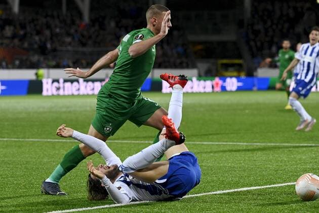 Jakub Piotrowski (top) of Ludogorets vies the ball with Perparim Hetemaj of HJK during the UEFA Europa League Group C first leg football match HJK Helsinki vs PFC Ludogorets Razgrad in Helsinki, Finland on October 6, 2022. Helsinki Finland LKFTJK20221006200859FOSI  Copyright: xEmmixKorhonenx LKFTJK20221006200859FOSI