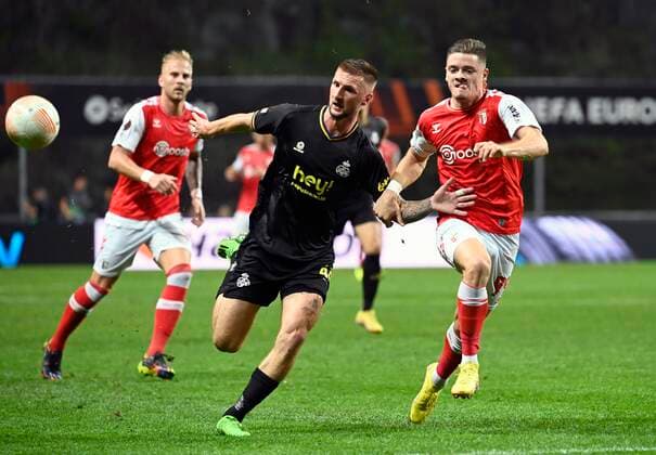 BRAGA, PORTUGAL - OCTOBER 06 : Oliveira Vitor of SC Braga and Van Der Heyden Siebe defender of Union St-Gilloise during Uefa Europa league match between SC Braga and Union St-Gilloise on October 6, 2022 in Estadio Municipal de Braga Braga, Portugal, 6 10 2022 ( SC Braga v Union St-Gilloise : Uefa Europa league PhotoNews Panoramic 
