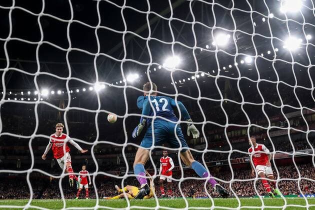 Mandatory Credit: Photo by Simon Dael Shutterstock (13442648af) Rob Holding of Arsenal scoring a goal (2-0) Arsenal v Bodo Glimt, UEFA Europa League, Group A, Football, Emirates Stadium, London, UK - 06 Oct 2022 EDITORIAL USE ONLY No use with unauthorised audio, video, data, fixture lists, club league logos or live services. Online in-match use limited to 120 images, no video emulation. No use in betting, games or single club league player publications. Arsenal v Bodo Glimt, UEFA Europa League, Group A, Football, Emirates Stadium, London, UK - 06 Oct 2022 EDITORIAL USE ONLY No use with unauthorised audio, video, data, fixture lists, club league logos or live services. Online in-match use limited to 120 images, no video emulation. No use in betting, games or single club league player publications. Copyright: xSimonxDael Shutterstockx 13442648af