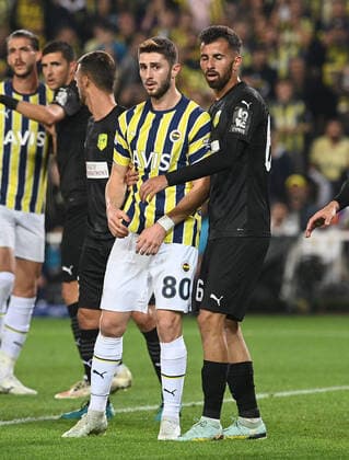 Ismail Yuksek of Fenerbahce and Oier Sanjurjo (R) of AEK Larnaca during the UEFA Europa League group B match between Fenerbahce and AEK Larnaca at Ulker Sukru Saracoglu Stadium in Istanbul, Turkey on October 6, 2022. ( Photo by Seskimphoto ) Fenerbahce v AEK Larnaca - UEFA Europa League Match 