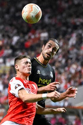 Braga s Vitor Vitinha and Union s Christian Burgess fight for the ball during a match between the Portugese club SC Braga and Belgian soccer team Royale Union Saint-Gilloise, Thursday 06 October 2022 in Braga, Portugal, the third game out of six in the group stage of the UEFA Europa League competition. LAURIExDIEFFEMBACQ  x46401262x