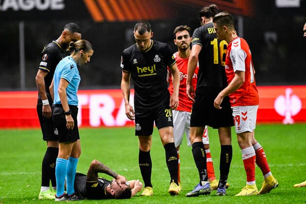 Union s Siebe Van Der Heyden lies injured on the ground during a match between the Portugese club SC Braga and Belgian soccer team Royale Union Saint-Gilloise, Thursday 06 October 2022 in Braga, Portugal, the third game out of six in the group stage of the UEFA Europa League competition. LAURIExDIEFFEMBACQ  x46401309x