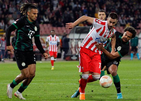 06.10.2022 Belgrade(Serbia) FK Crvena Zvezda(Red Star)- Ferencvaros Europa League men s football Aleksandar Pesic(C) Crvena Zvezda(Red Star) between Samy Mmaee(L),Henry Wingo(R) Ferencvaros :Str