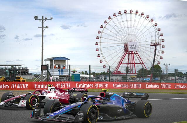 (221008) -- SUZUKA, Oct. 8, 2022 -- Williams Canadian driver Nicholas Latifi (front) and Alfa Romeo s Chinese driver Zhou Guanyu compete during the third practice session of the Formula One Japan Grand Prix held at the Suzuka Circuit in Suzuka City, Japan, on Oct. 8, 2022. ) (SP)JAPAN-SUZUKA-F1-JAPAN GRAND PRIX-3RD PRACTICE ZhangxXiaoyu 