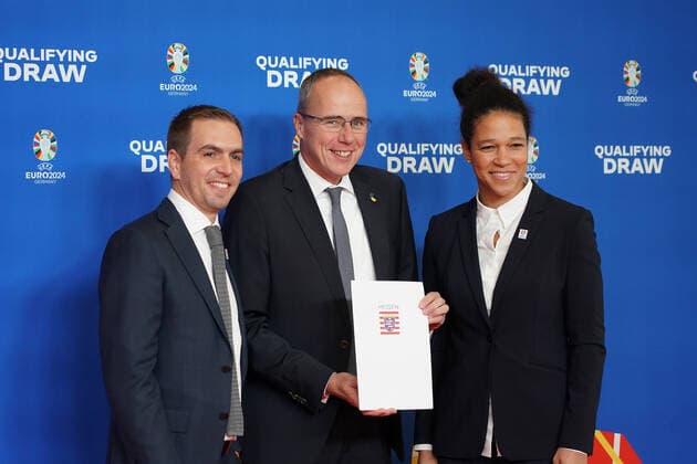 EURO2024 Ambassadors Philipp Lahm and Celia Sasic with Hesses Minister of the Interior Peter Beuth at the draw for the qualifying groups for the 2024 European Championship in Frankfurts Festhalle 09 10 2022 EURO2024 Qualifying Draw EM 2024 Draw for the qualifying groups, Festhalle Frankfurt