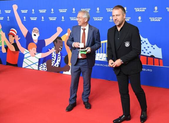 09 10 2022 Frankfurt am Main, EURO2024 Qualifying Draw EM 2024 Draw of the qualifying groups, Festhalle Frankfurt national coach Hansi Flick Germany visibly irritated next to Frankfurts mayor Peter Feldmann with coffee nose on the red carpet emspor, DFL regulations prohibit any use of photographs as image sequences and or quasi video