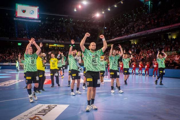Handball Berlin 09 10 2022 season 2022 2023 HBL 1 Bundesliga foxes Berlin THW Kiel jubilation foxes after victory Paul Drux foxes Berlin, No 95 vo Hans Lindberg foxes Berlin, No 18 li Jacob Tandrup Holm foxes Berlin, No 06 and others