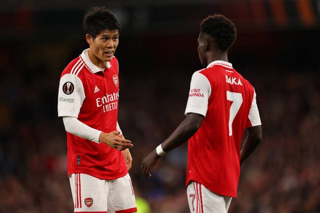 20th October 2022; Emirates Stadium, London, England; Europa League Football, Arsenal versus PSV Eindhoven; Takehiro Tomiyasu of Arsenal speaks with Bukayo Saka about tactics  ActionPlus12438020 ShaunxBrooks