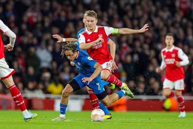 Arsenal v PSV Eindhoven Europa League 20 10 2022. Group A Xavi Simons (7) of PSV Eindhoven is brought down by Martin Odegaard (8) of Arsenal during the Europa League match between Arsenal and PSV Eindhoven at the Emirates Stadium, London, England on 20 October 2022. Editorial use only , Copyright: xNigelxKeenex PSI-16182-0067