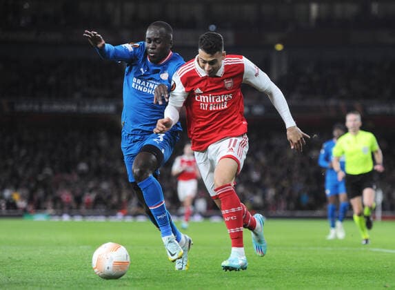 Football - 2022 2023 UEFA Europa League - Group A - Round Two - Arsenal vs PSV Eindhoven - Emirates Stadium - Thursday 20th October 2022 Gabriel Martinelli of Arsenal and Jordan Teze of Eindhoven 