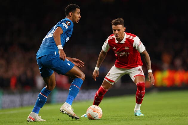 20th October 2022; Emirates Stadium, London, England; Europa League Football, Arsenal versus PSV Eindhoven; Cody Gakpo of PSV Eindhoven takes on Ben White of Arsenal  ActionPlus12438181 ShaunxBrooks