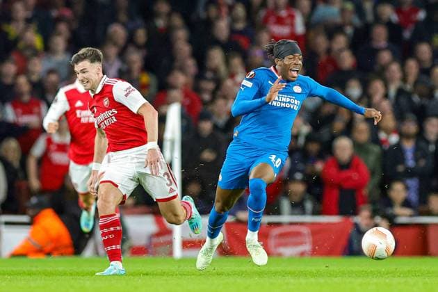 Arsenal v PSV Eindhoven Europa League 20 10 2022. Group A Noni Madueke (10) of PSV Eindhoven reacts to the challenge by Kieran Tierney (3) of Arsenal during the Europa League match between Arsenal and PSV Eindhoven at the Emirates Stadium, London, England on 20 October 2022. Editorial use only , Copyright: xNigelxKeenex PSI-16182-0099