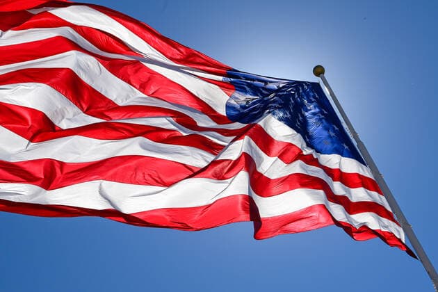 AUSTIN, TX - OCTOBER 21: The American flag flies high above turn 1 during F1 US Grand Prix prep day at Circuit of the Americas on October 21, 2022 in Austin, TX. (Photo by Ken Murray Icon Sportswire) AUTO: OCT 21 F1 US Grand Prix Icon2210210321