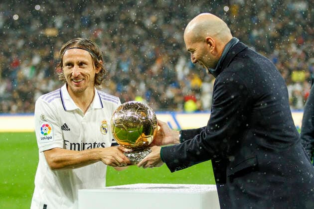October 22, 2022, Madrid, Spain: Luka Modric of Real Madrid and Zinedine Zidane with the Ballon DÃ¢â‚¬â ¢Or during La Liga Santader match between Real Madrid and Sevilla FC at Estadio Santiago Bernabeu in Madrid, Spain. Madrid Spain - ZUMAd159 20221022_zia_d159_086 Copyright: xPabloxGarciax
