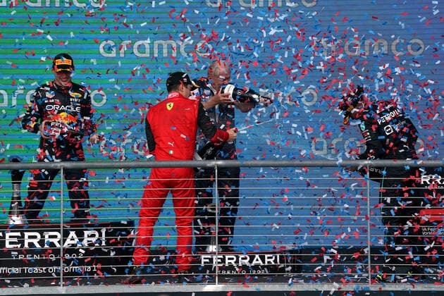 Dutch Formula One driver Max Verstappen of Red Bull Racing, Monaco s Formula One driver Charles Leclerc of Scuderia Ferrari, Red Bull Racing advisor Helmut Marko and British Formula One driver Lewis Hamilton of Mercedes-AMG Petronas spray champagne during the podium ceremony after the Formula One Grand Prix of the US at the Circuit of The Americas in Austin, Texas, on Sunday, October 23, 2022.  AUS20221023514 GREGxNASH
