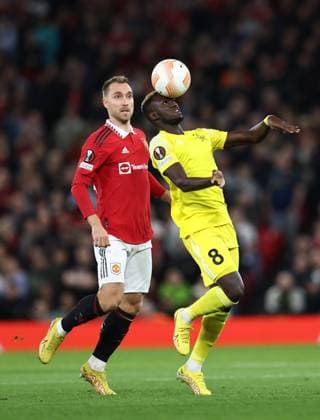 Manchester, England, 27th October 2022. Christian Eriksen of Manchester United, ManU with Mouhamed Diop of FC Sheriff Tiraspol during the UEFA Europa League match at Old Trafford, Manchester. Picture credit should read: Darren Staples Sportimage EDITORIAL USE ONLY. No use with unauthorised audio, video, data, fixture lists, club league logos or live services. Online in-match use limited to 120 images, no video emulation. No use in betting, games or single club league player publications. SPI-1993-0011