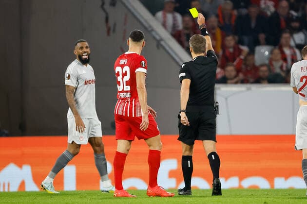 Yann M Vila Olympiacos FC, 06 gets yellow card from referee Kristo Tohver , GER, SC Freiburg vs Olympiacos FC, football, UEFA Europa League, Matchday 5, Group Stage, 27 10 2022 GER, SC Freiburg vs Olympiacos FC, football, UEFA Europa League, Matchday 5, Group Stage, 27 10 2022 Freiburg im Breisgau, Germany Copyright: xEibner-Pressefoto GrantxHubbsx EP_GHS