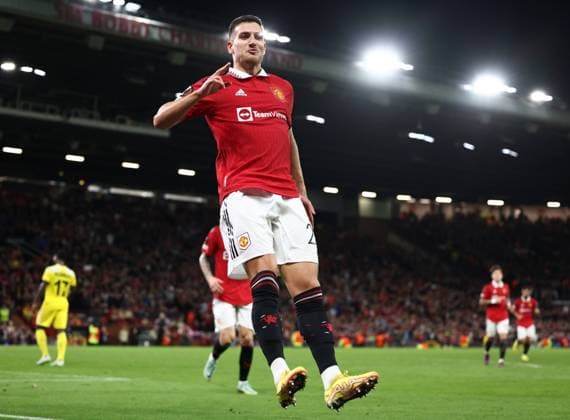 Manchester, England, 27th October 2022. Diogo Dalot of Manchester United, ManU celebrates scoring the first goal during the UEFA Europa League match at Old Trafford, Manchester. Picture credit should read: Darren Staples Sportimage EDITORIAL USE ONLY. No use with unauthorised audio, video, data, fixture lists, club league logos or live services. Online in-match use limited to 120 images, no video emulation. No use in betting, games or single club league player publications. SPI-1993-0027