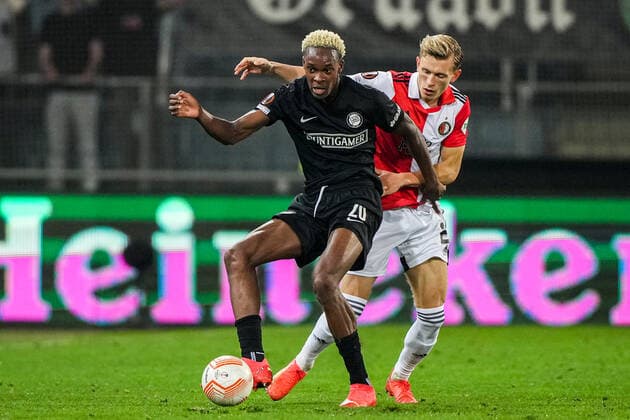 UEFA Europa League: SK Sturm Graz v Feyenoord Graz - Emmanuel Emegha of Strum Graz, Marcus Holmgren Pedersen of Feyenoord during the match between SK Sturm Graz v Feyenoord at Stadion Graz-Liebenau on 27 October 2022 in Graz, Austria. Copyright: xTomxBodex